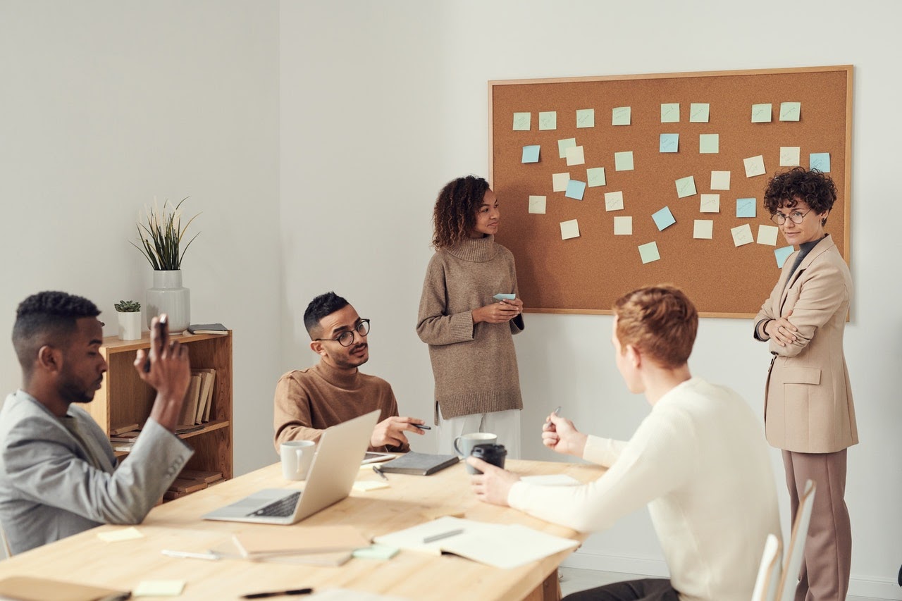 Designers, engineers, and product manager working together