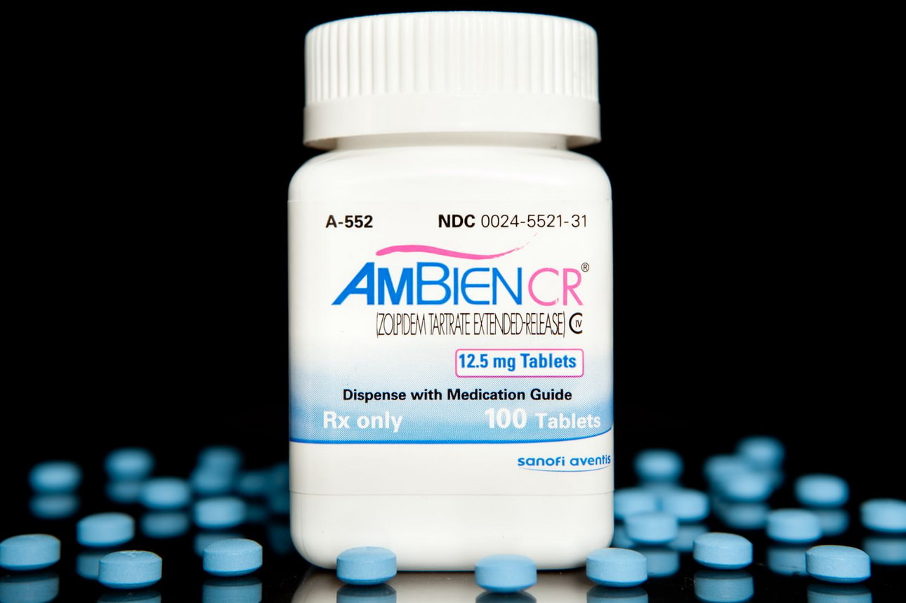 Ambien C 100mg tablets displayed in a blister pack, labeled for sleep aid use.