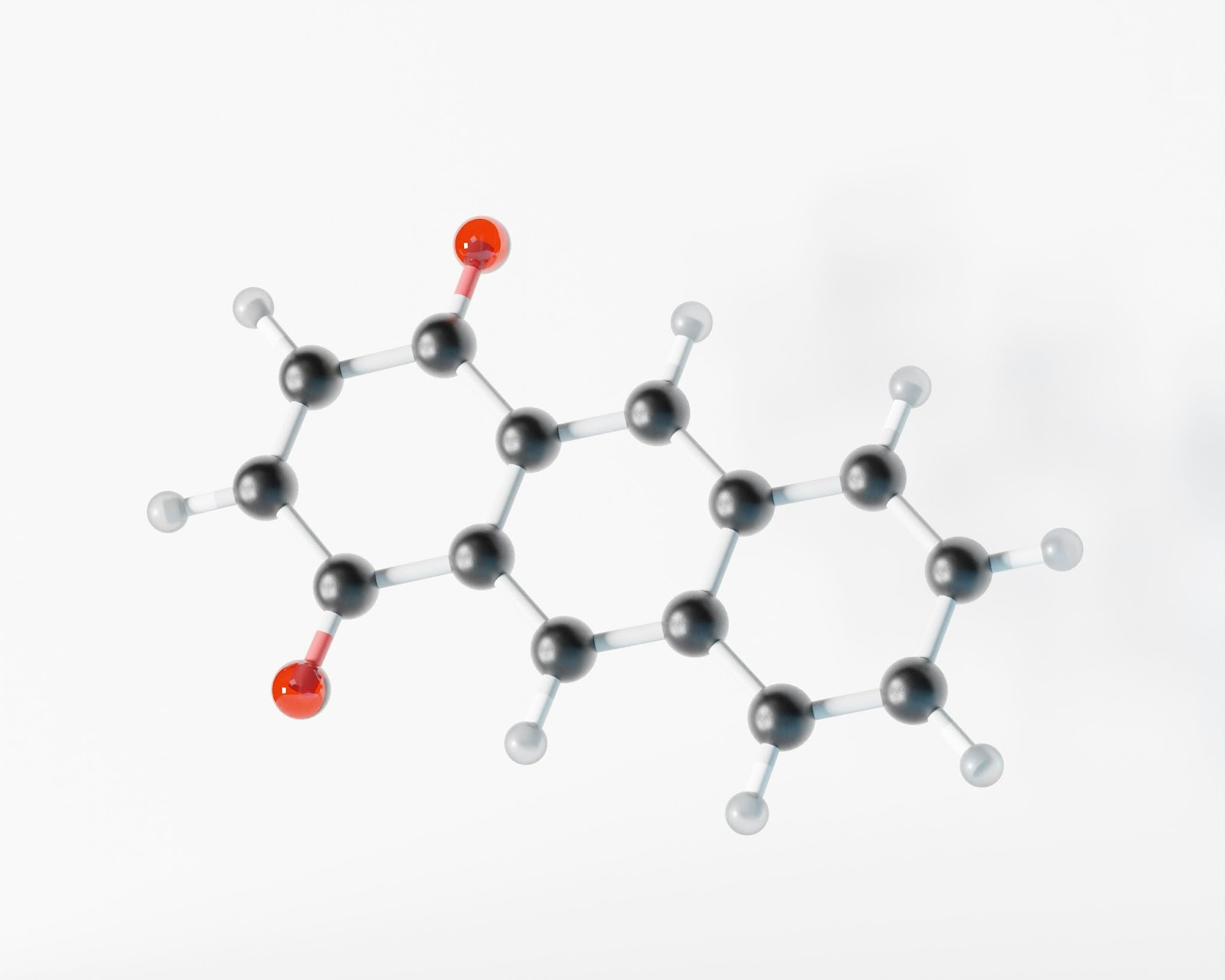 A molecular model featuring red and black dots representing atoms and their connections in a three-dimensional structure.