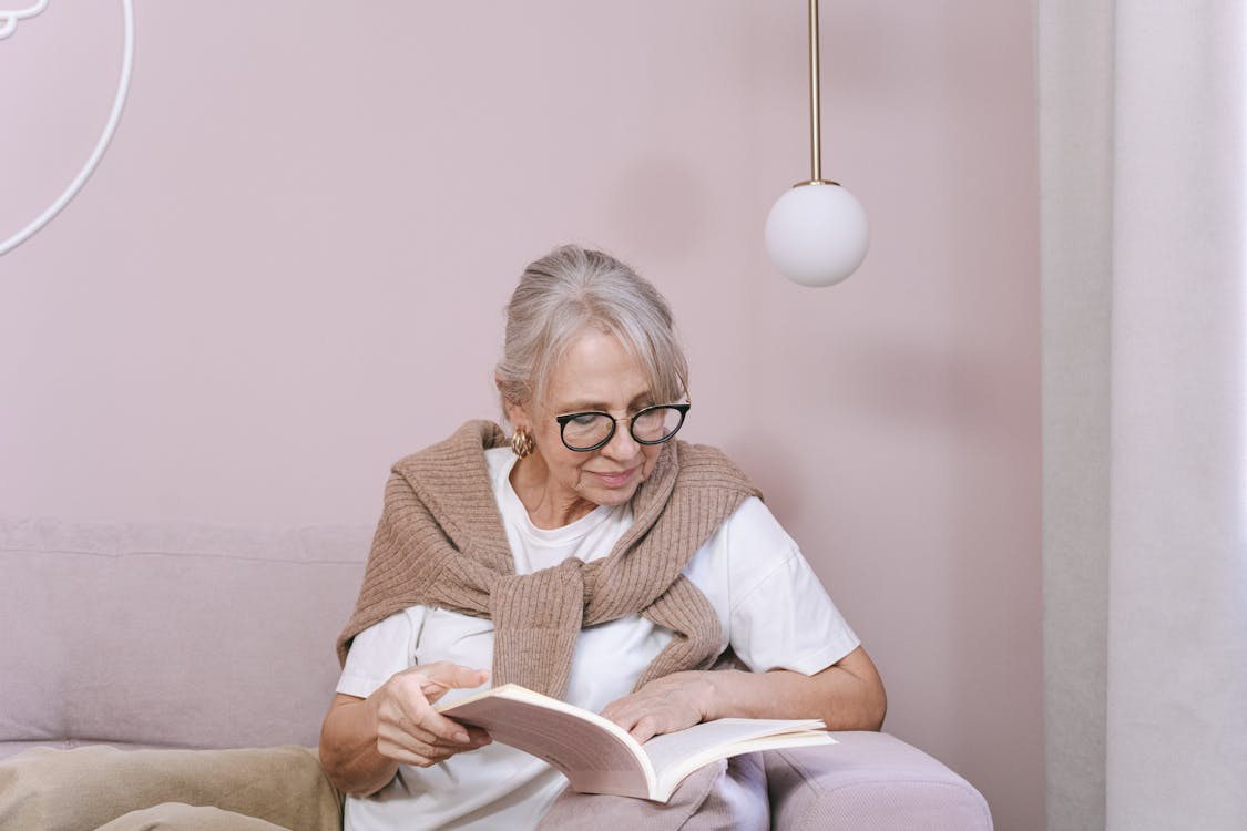 Old Woman reading  her book