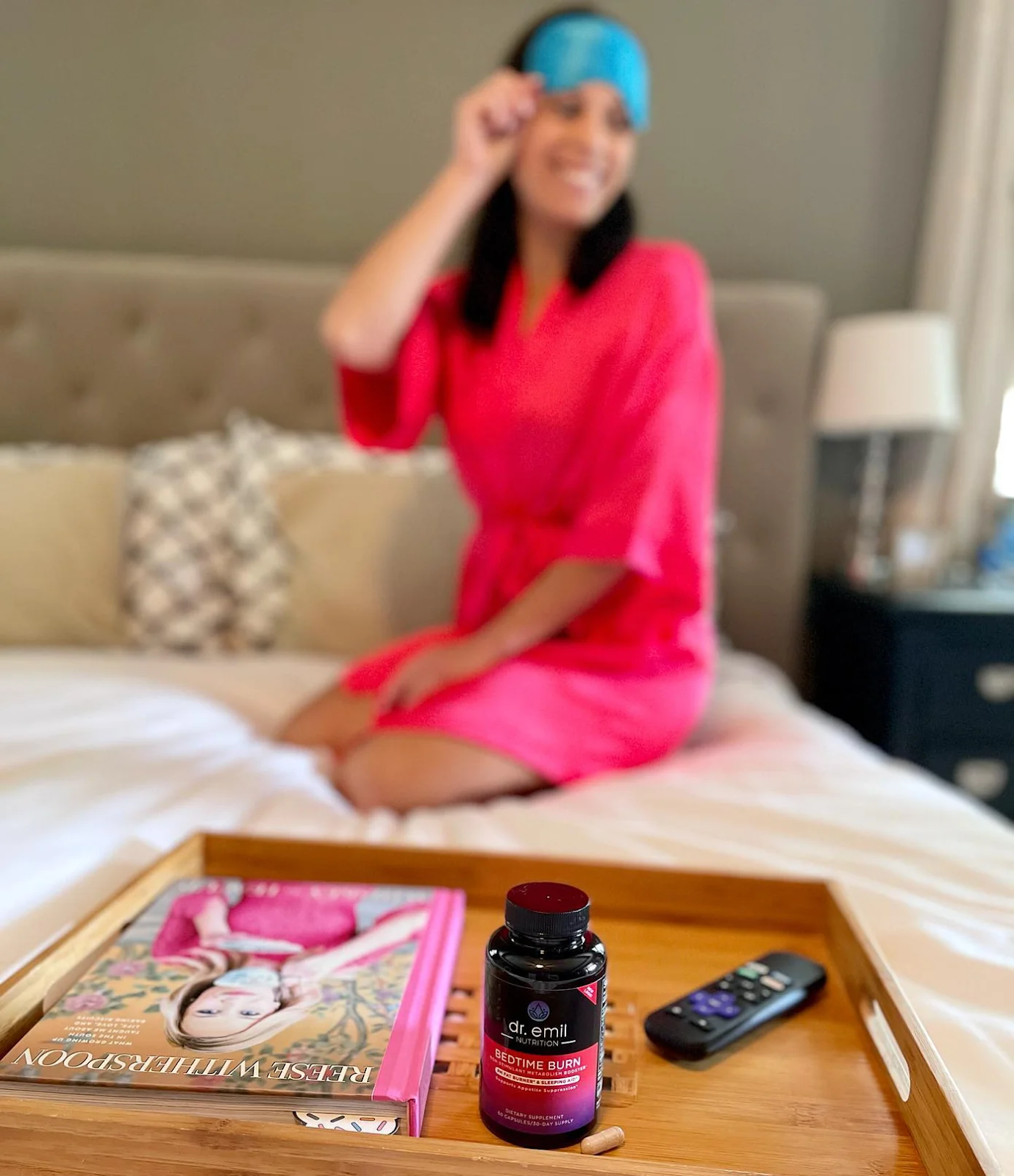 woman in a sleep mask posing with Dr. Emil Bedtime Burn