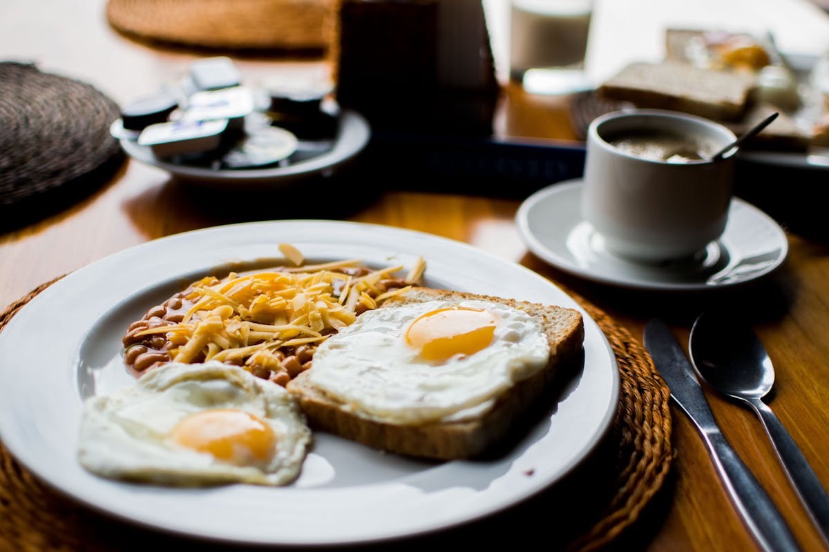 eggs, toast, and beans make up a protein rich breakfast