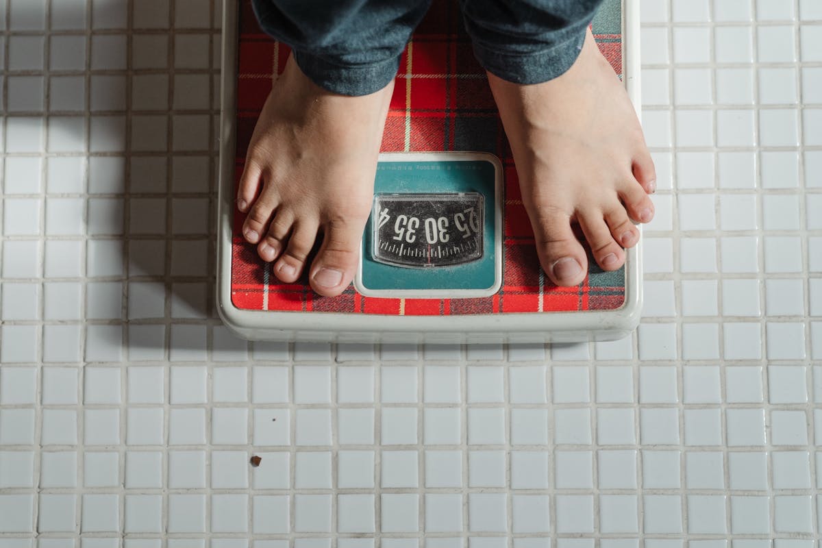 looking down at a bathroom scale