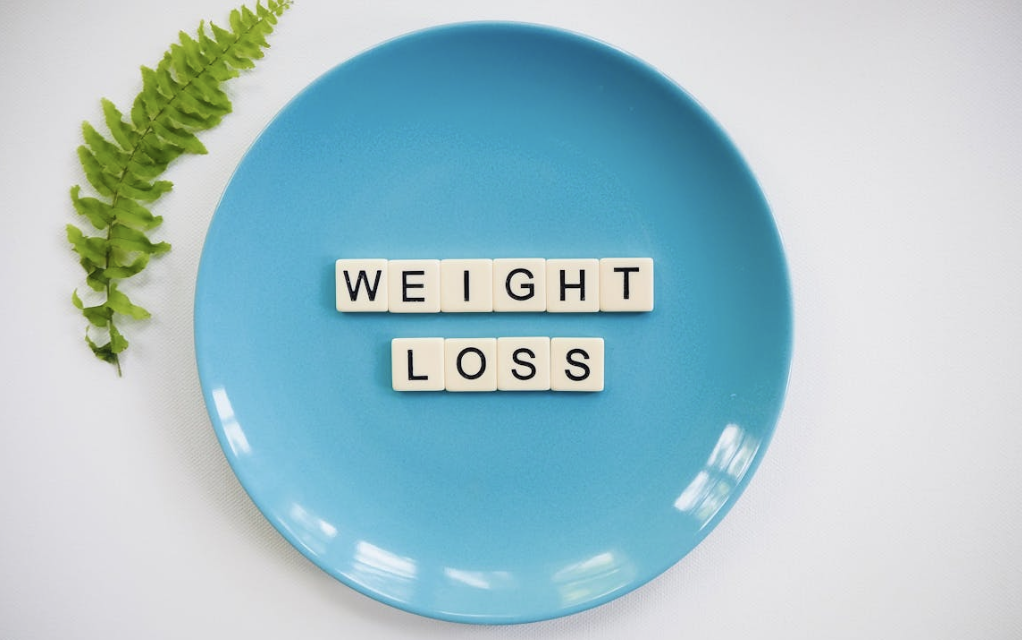 weight loss spelled out on a plate