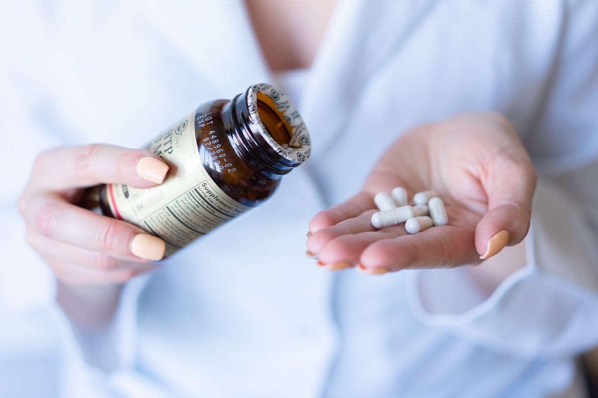 person taking supplements for cognitive support