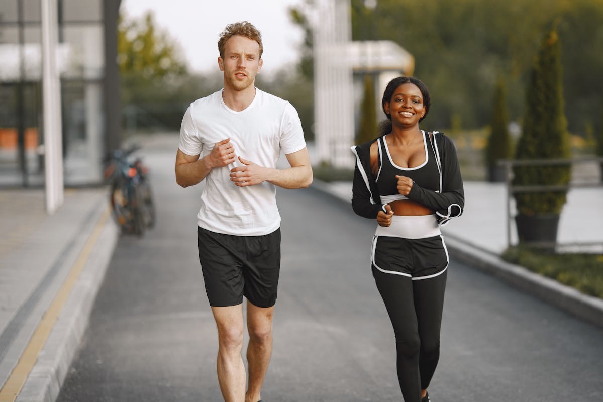 healthy couple on a pain-free jog thanks to proper joint function