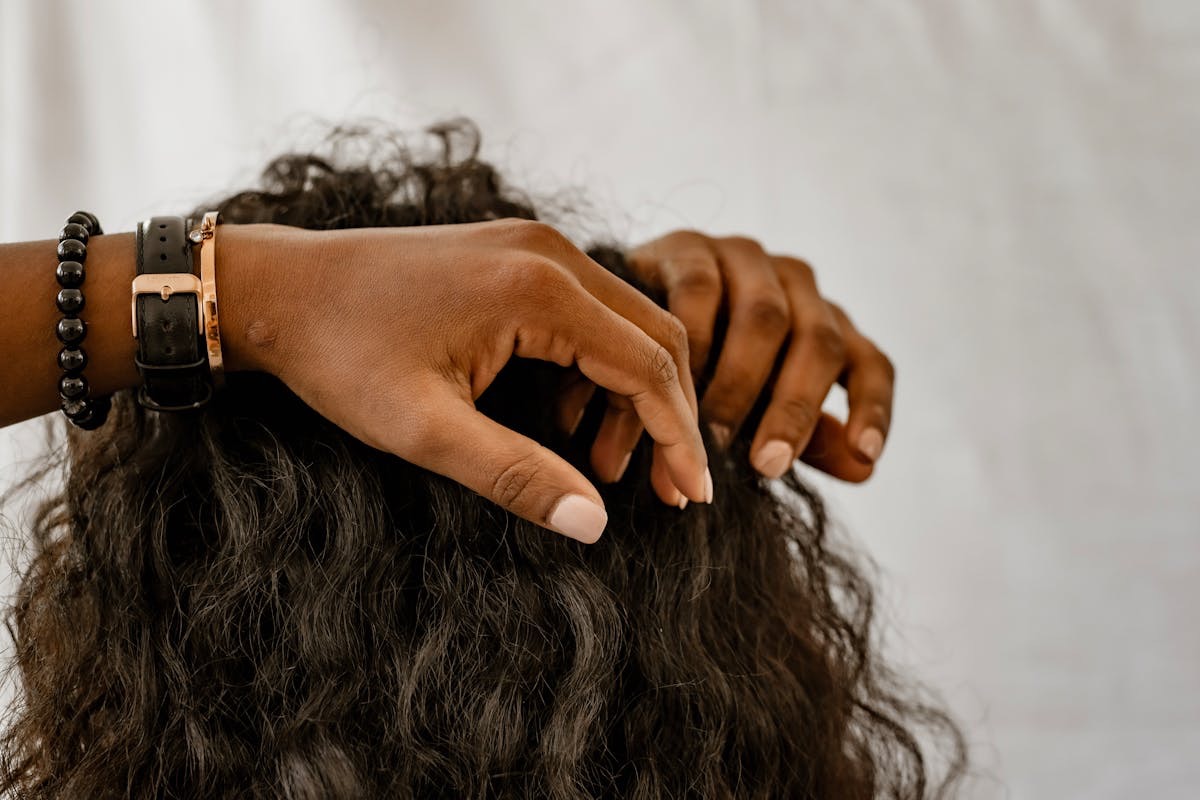 woman with long, curly brown hair