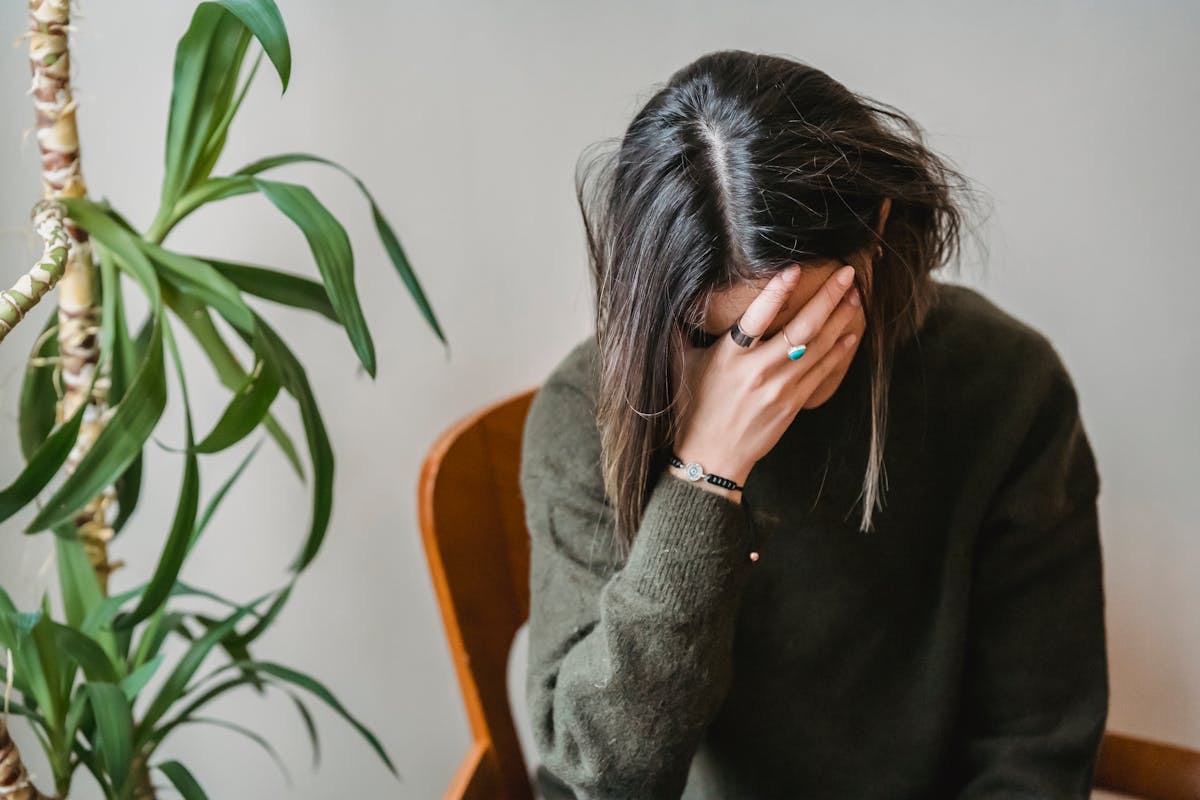 woman with depression struggling to go about her day
