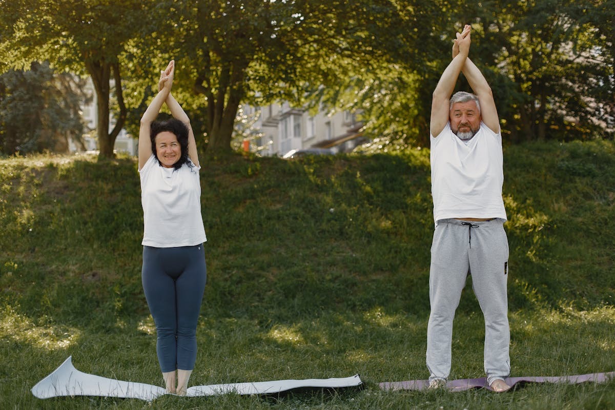 older adults who take collagen supplements for joint support leading an active lifestyle by doing yoga outside