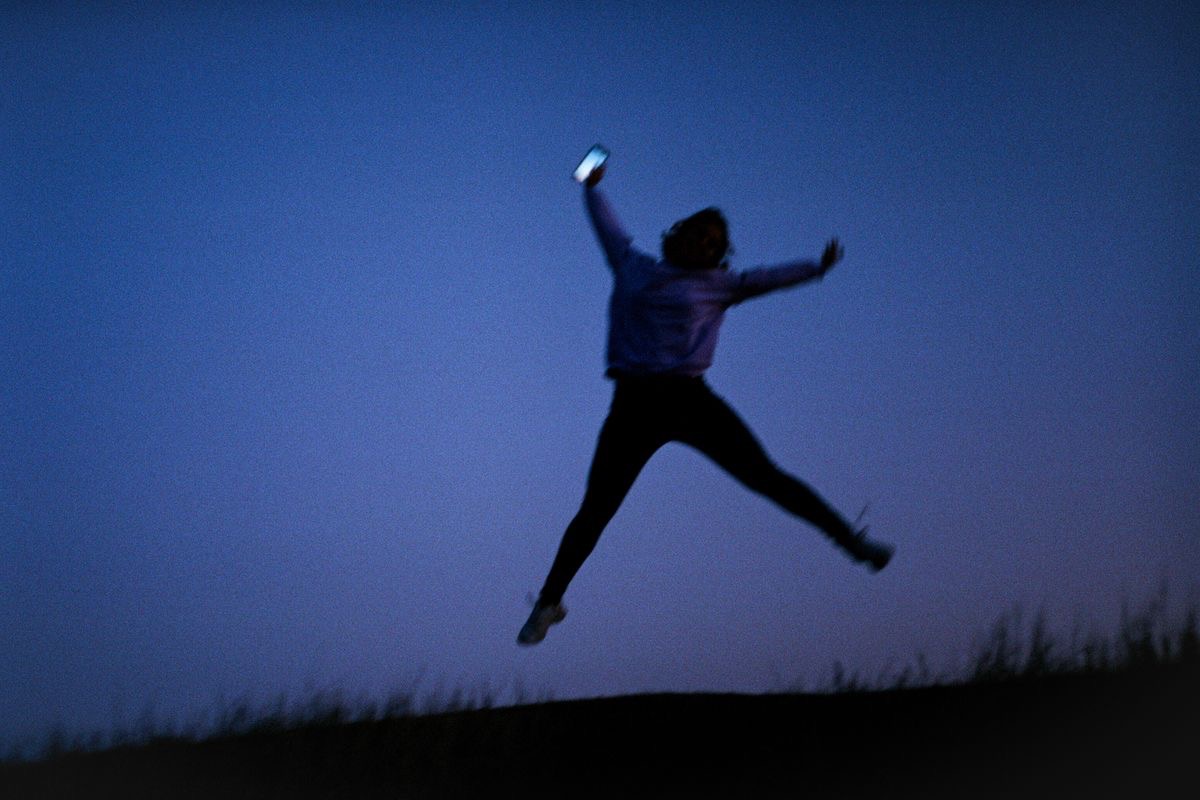 figure jumping in silhoutte
