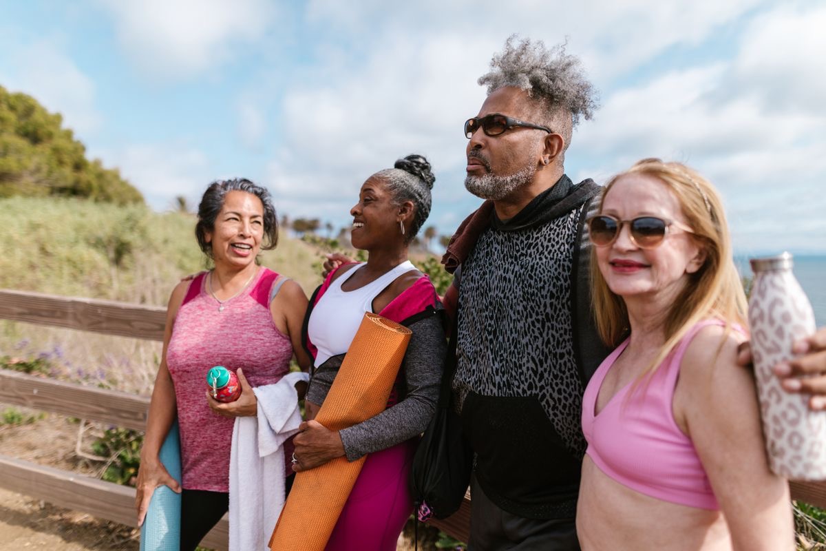 group of older adults enjoying a hike together