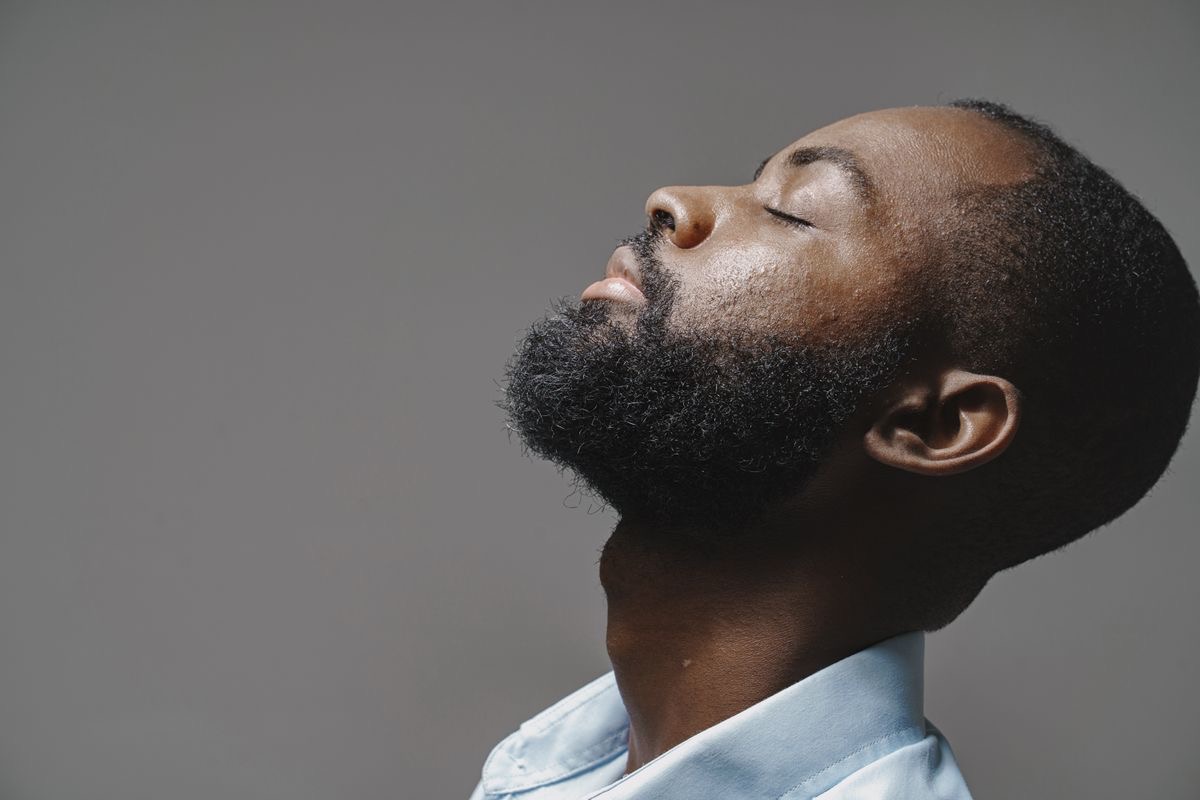 man with healthy beard due to supplements