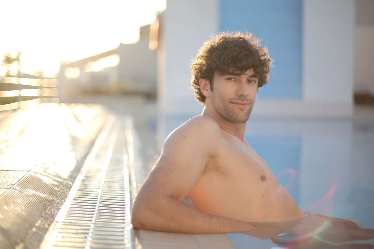 man with messy curly hair
