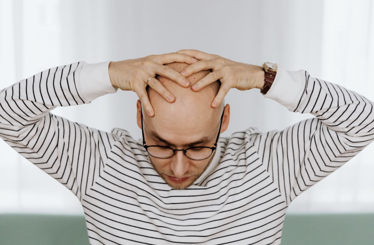 man dealing with weight loss related hair loss