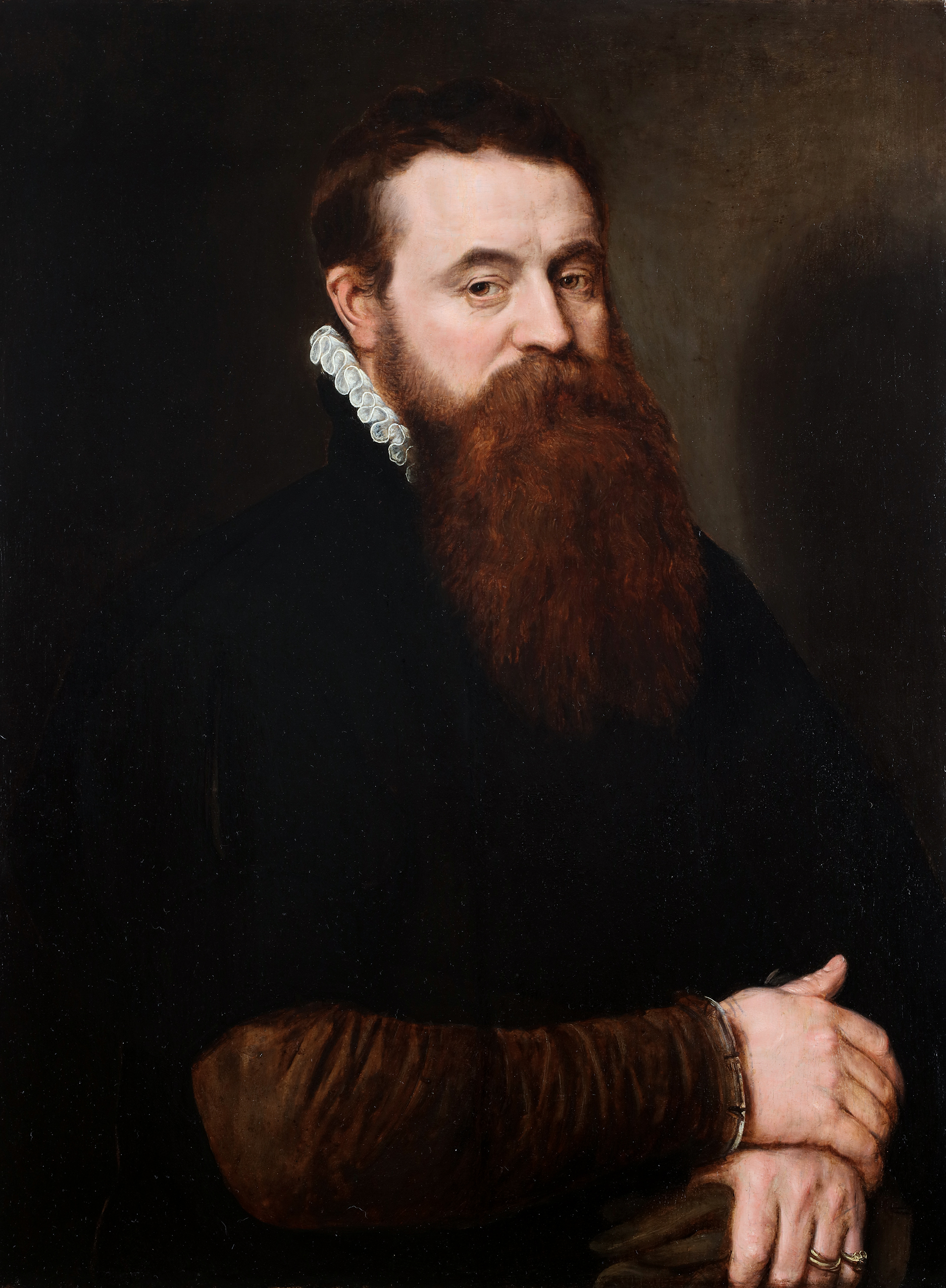A portrait of a bearded man