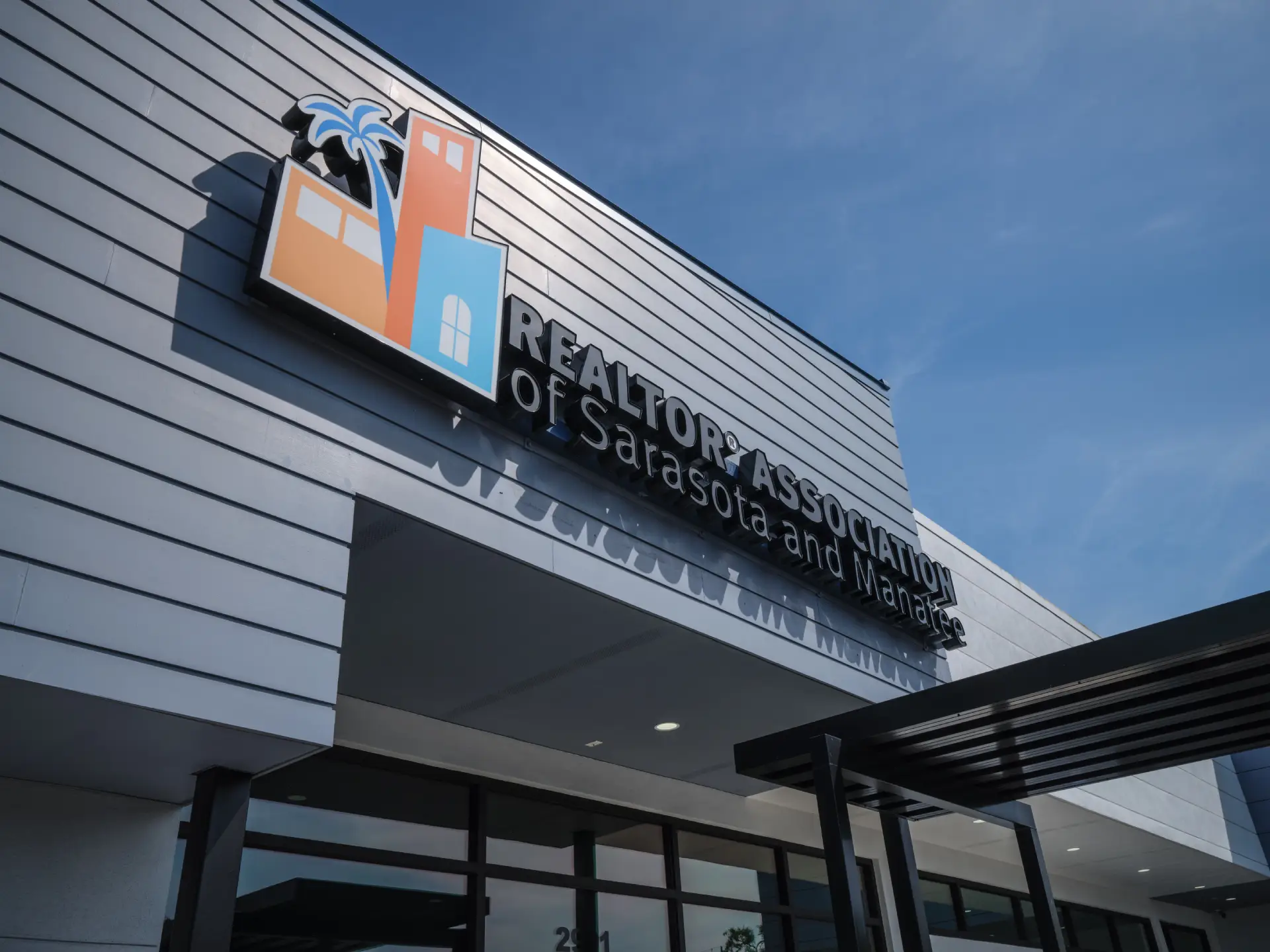 Commercial architecture design project: Realtor Association of Sarasota and Manatee building frontage and signage.