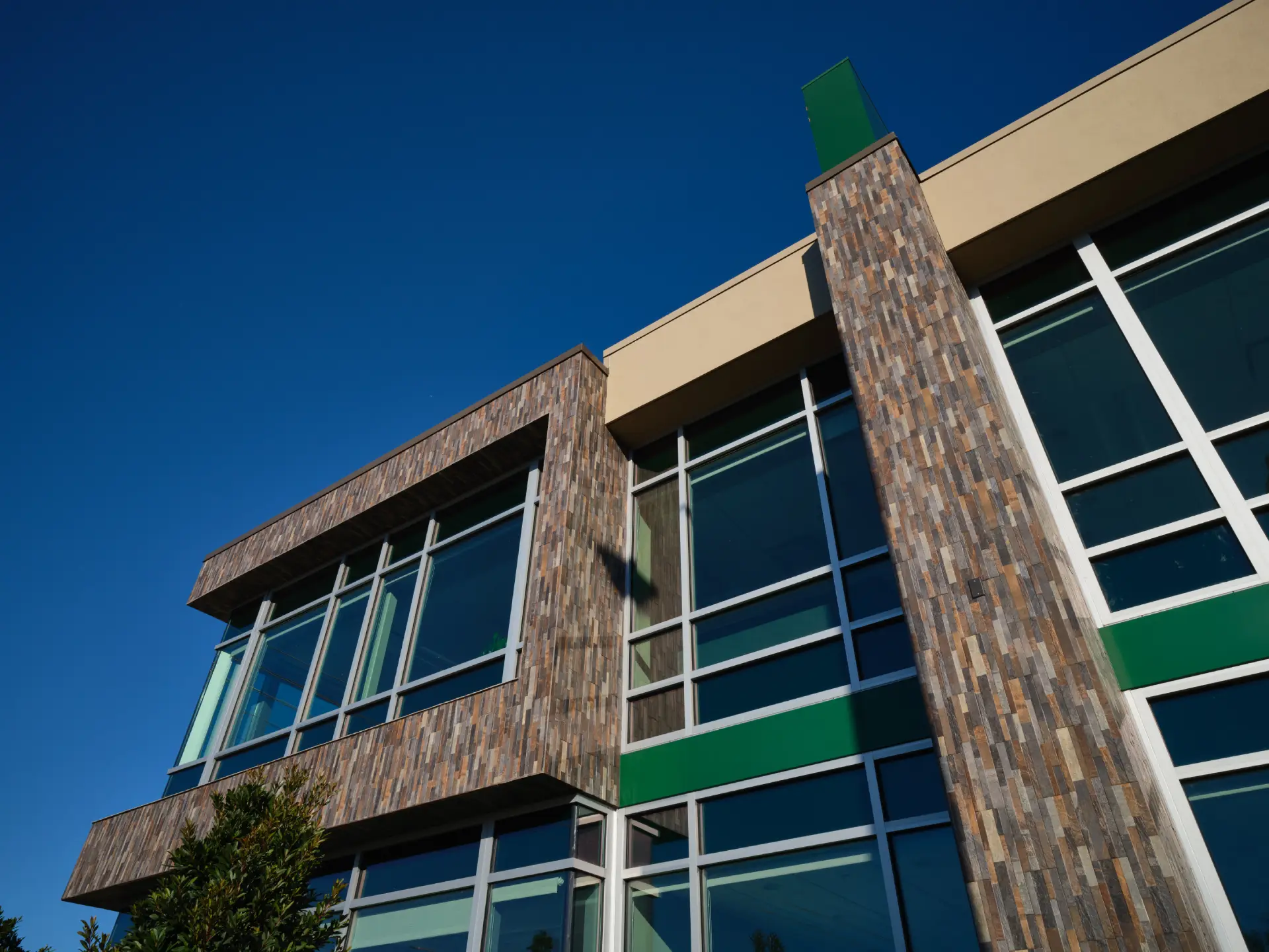 Bayfirst Bank commercial architecture building exterior corner detail view. Clevation designed by Suarez Architecture, Sarasota, FL