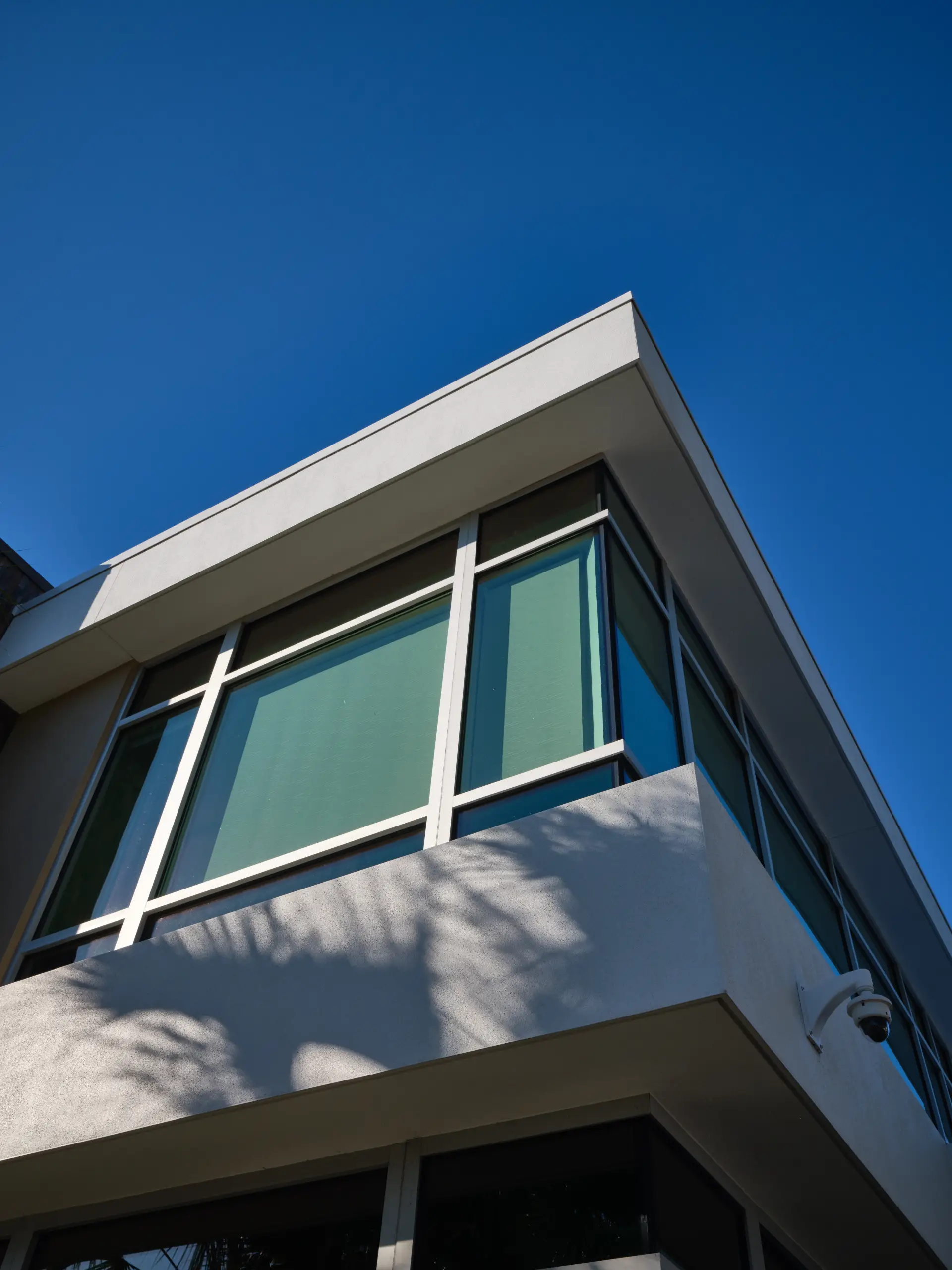 Bayfirst Bank commercial architecture building exterior corner detail. Designed by Suarez Architecture, Sarasota, FL
