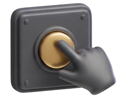 A hand pressing a large gold button on a control panel