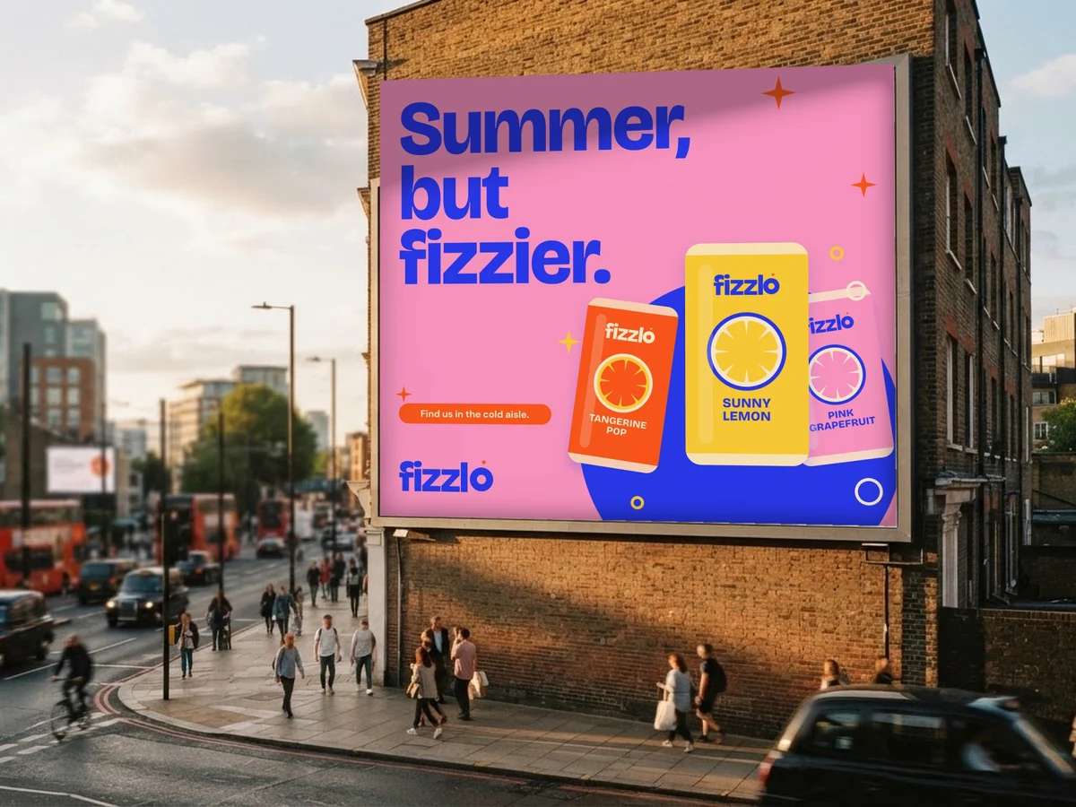 A Fizzlo billboard on a brick wall at golden hour reading "Summer, but fizzier."