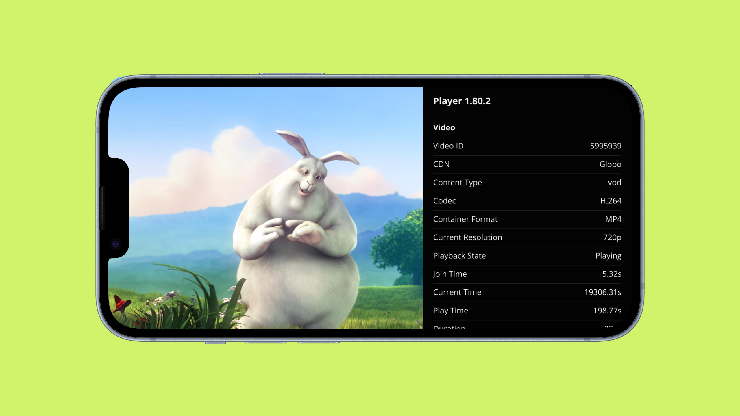 A hand is holding an iPhone with a video player in it. On top of the video, an overlay displays stats about the video playback. In the background, a blurred Macbook with Xcode open.