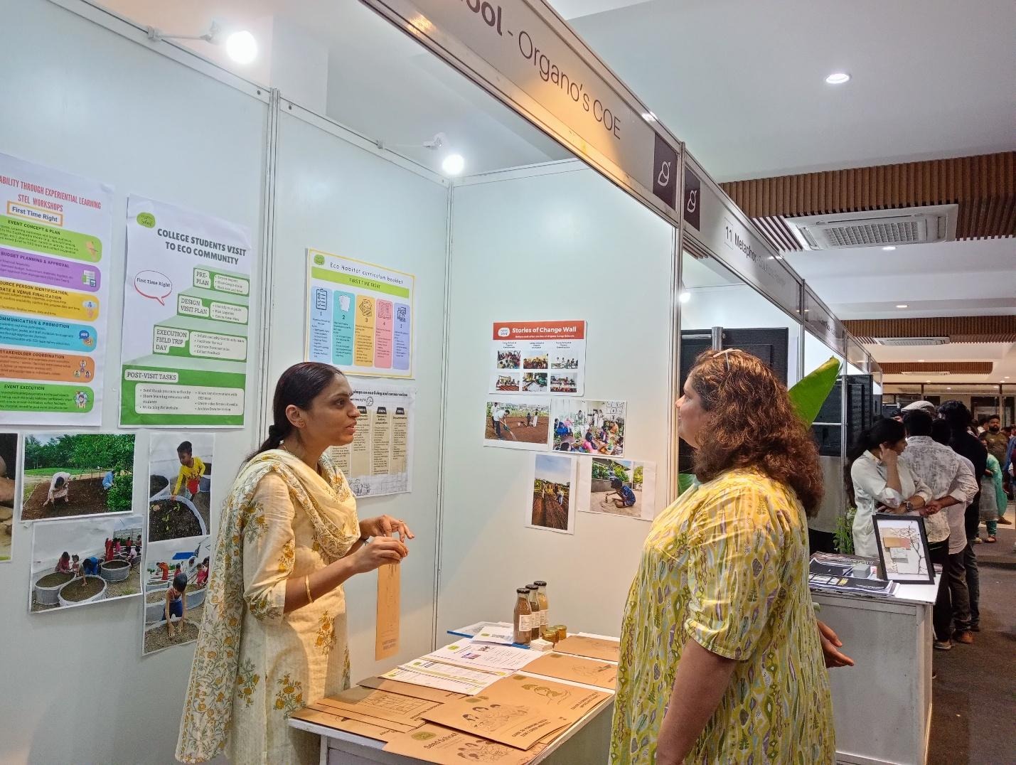 A group of women standing in a roomAI-generated content may be incorrect.