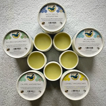 Natural massage wax on a stone platform