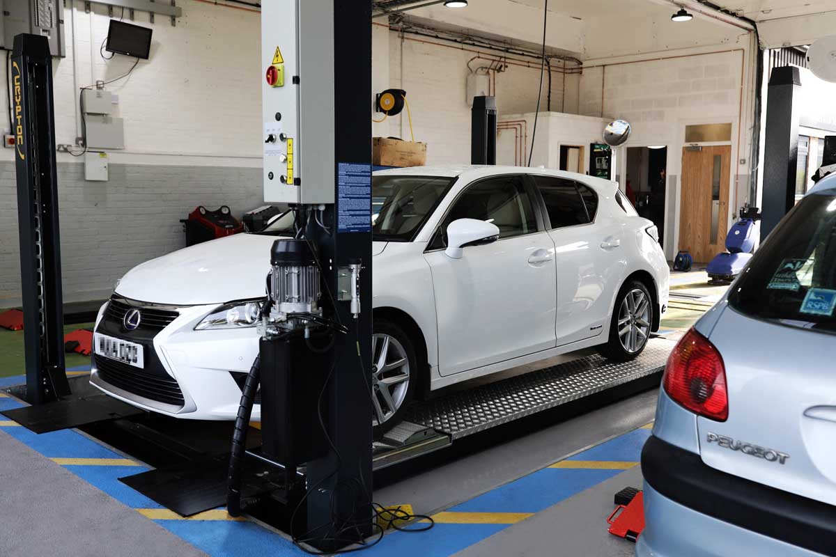Lexus car on garage ramp