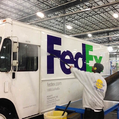 20/20 View employees washing fleet ground with 18 wheeler truck in Columbus, OH