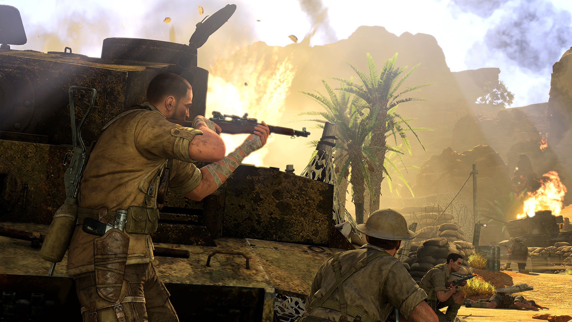 A rifleman taking cover behind a tank.