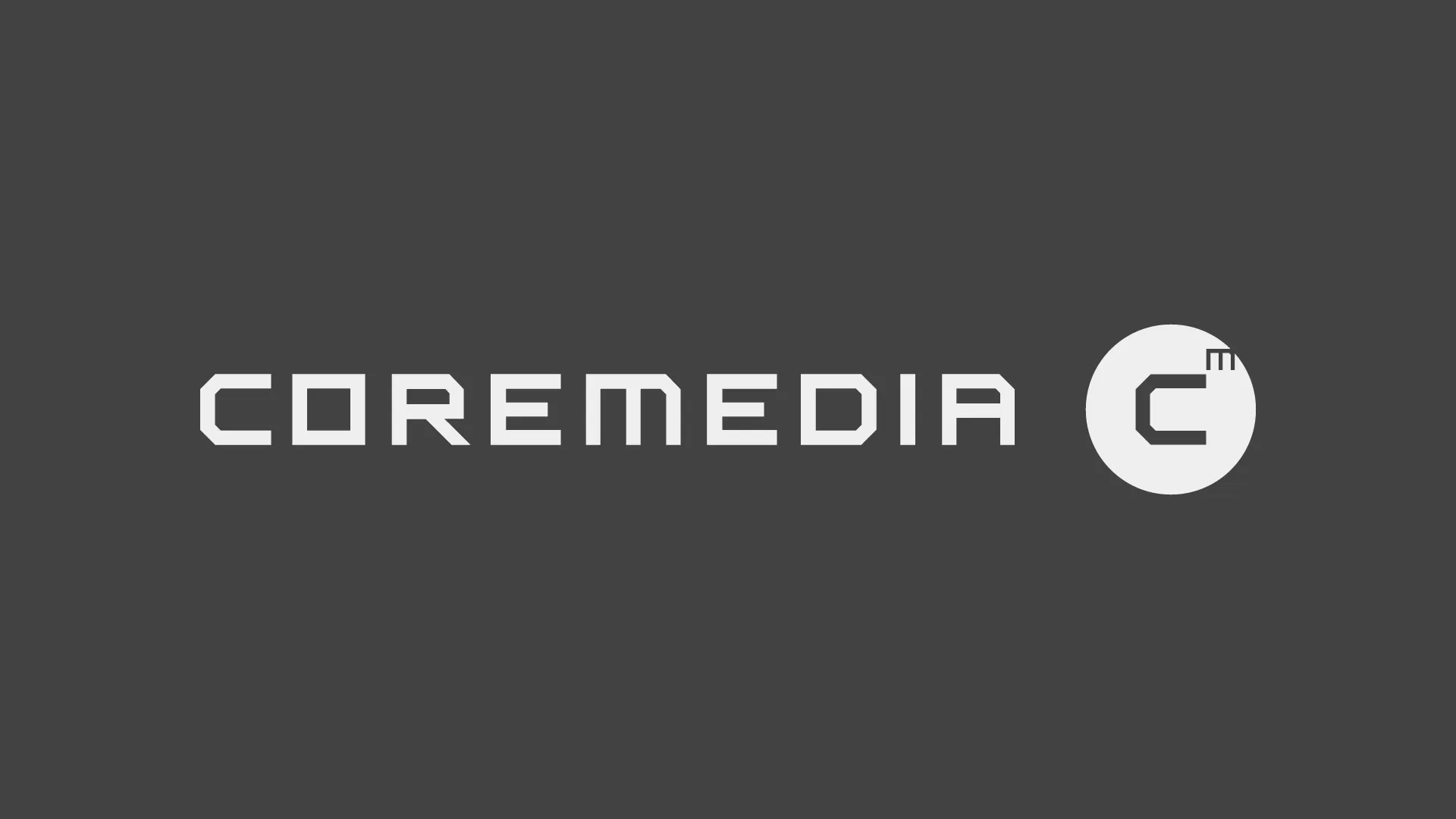 CoreMedia Logo auf grauem Hintergrund