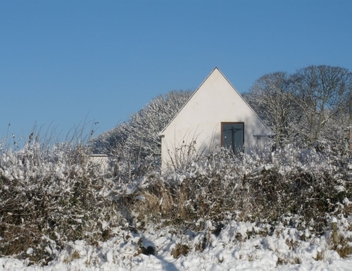 A high-function family dwelling with a low impact on the site and locality.