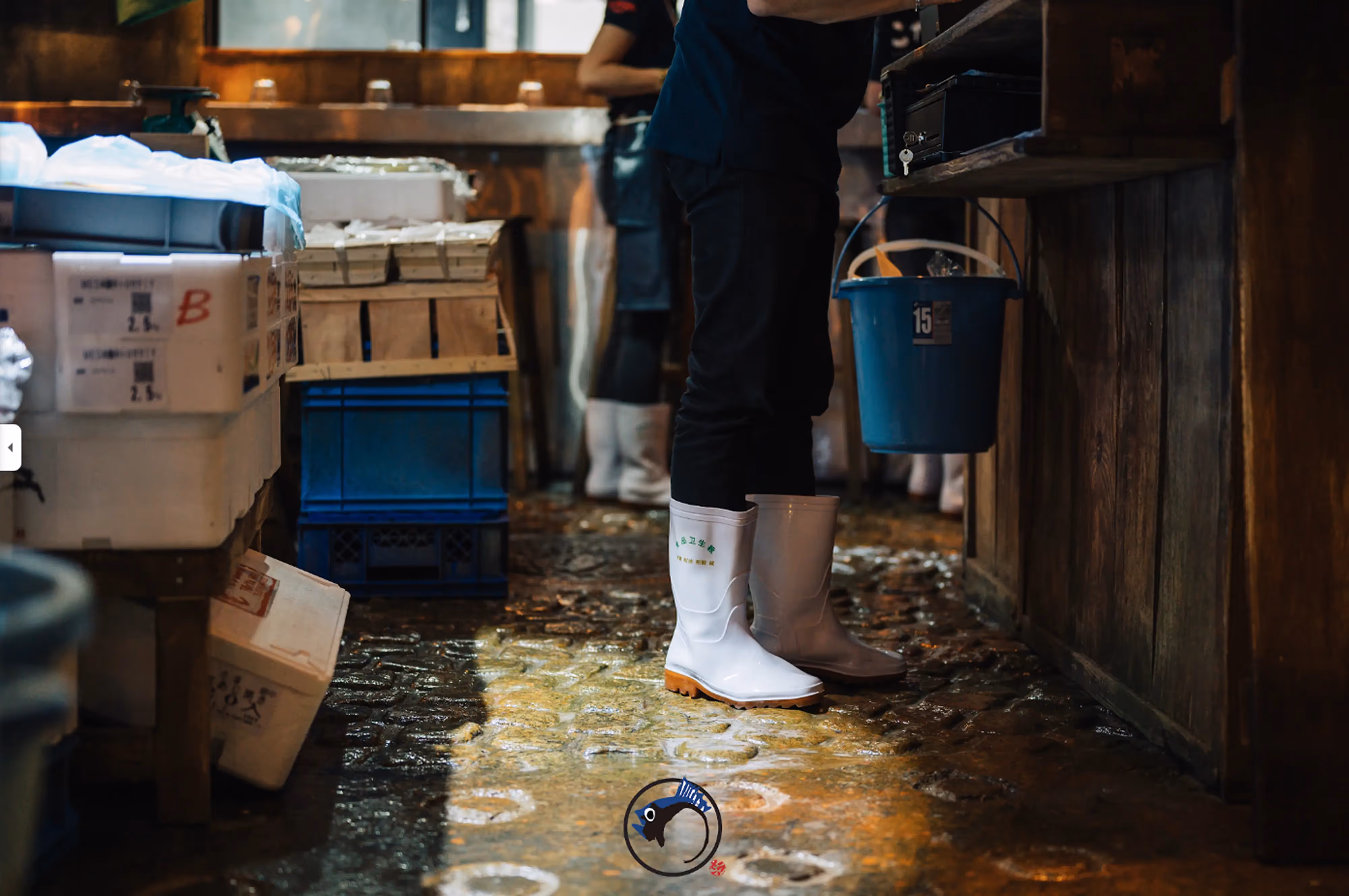 Close-up of hyper-realistic fake fish in ice and liquid, mimicking fresh seafood in market-style bins