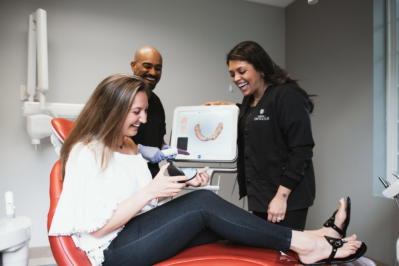 Photo of a team member and a patient bumping elbows