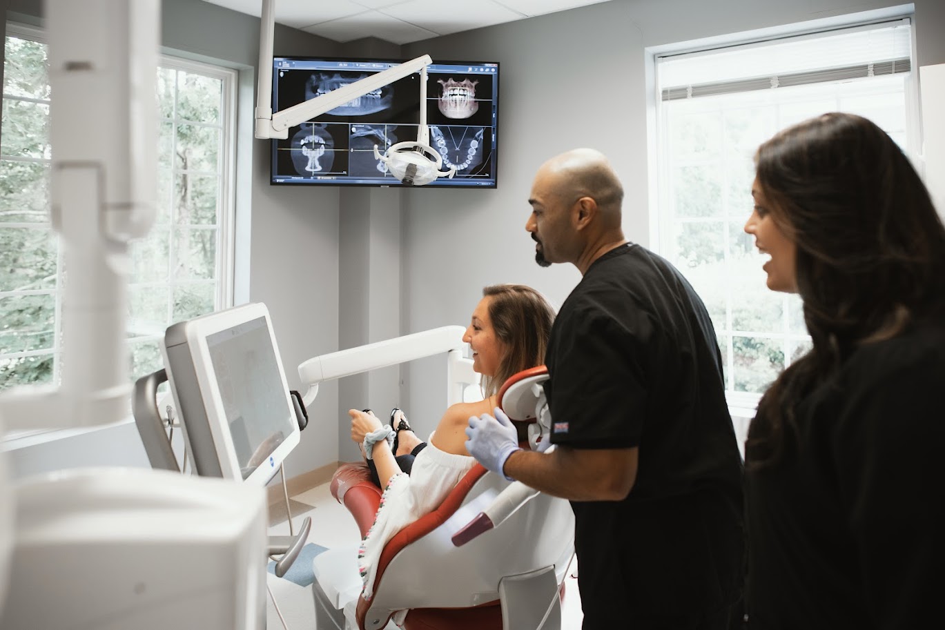 Photo of a team member and a patient bumping elbows
