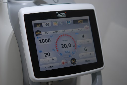 Photo of a team member and a patient bumping elbows