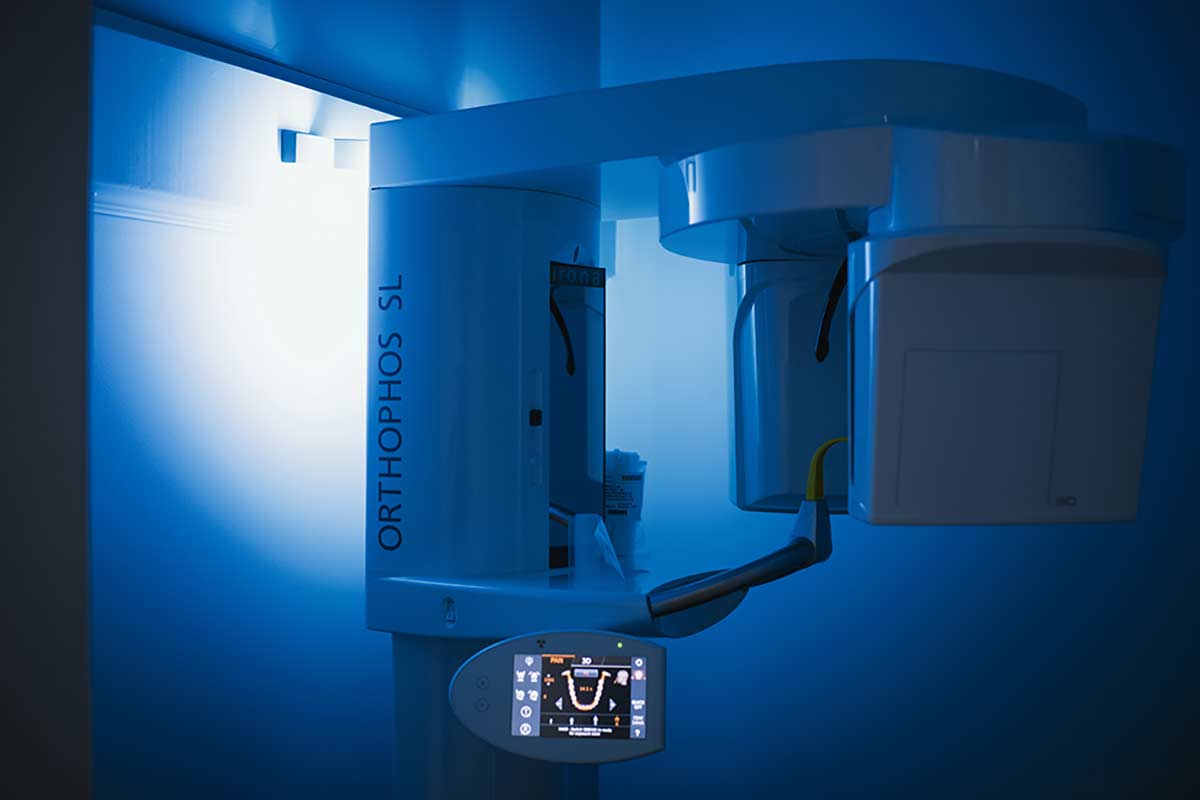 Photo of a team member and a patient bumping elbows