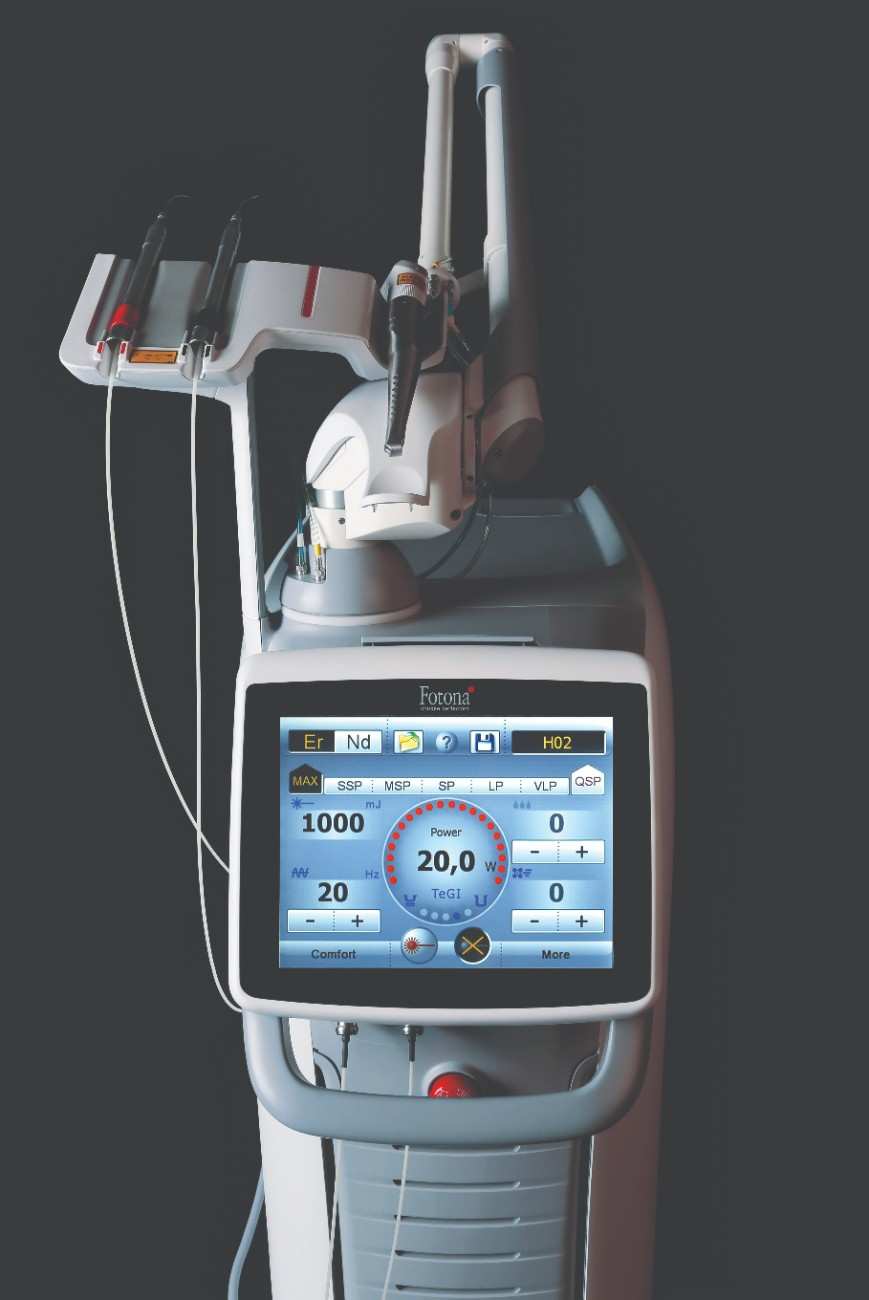 Photo of a team member and a patient bumping elbows