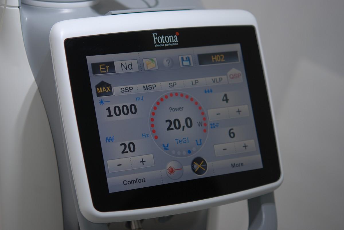 Photo of a team member and a patient bumping elbows