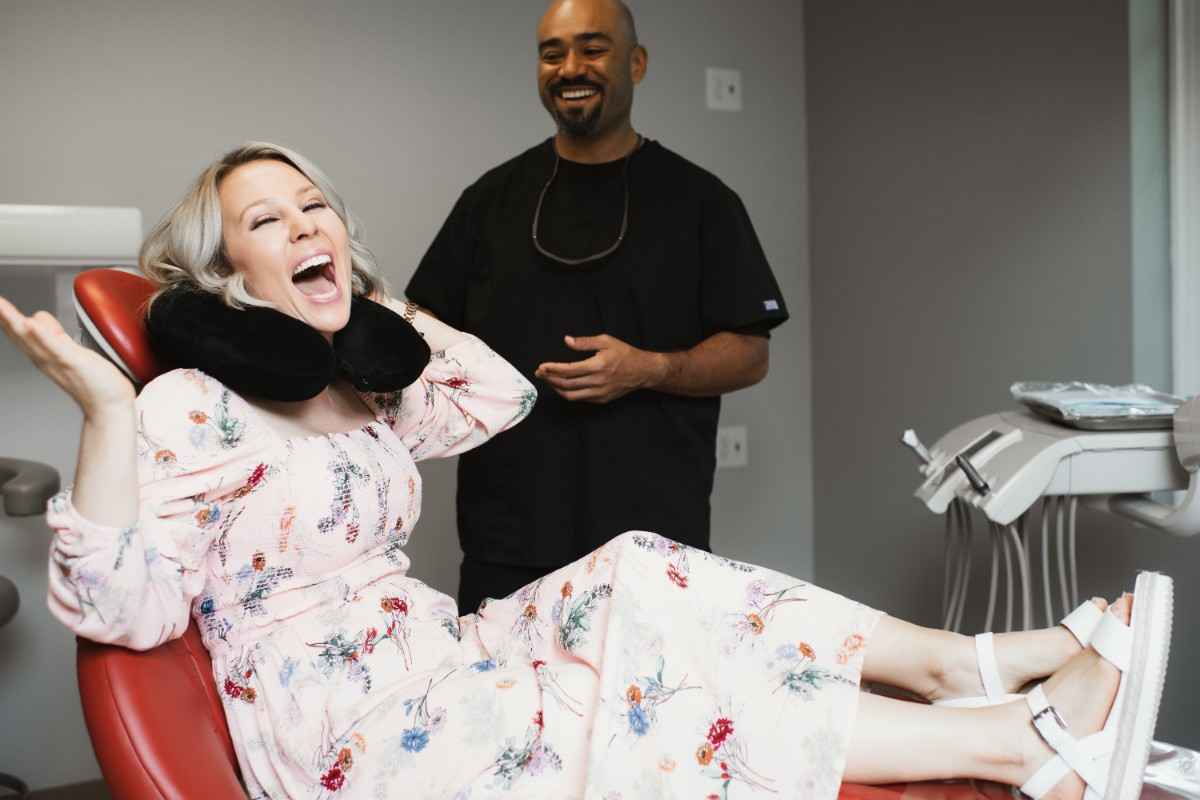 Photo of a team member and a patient bumping elbows