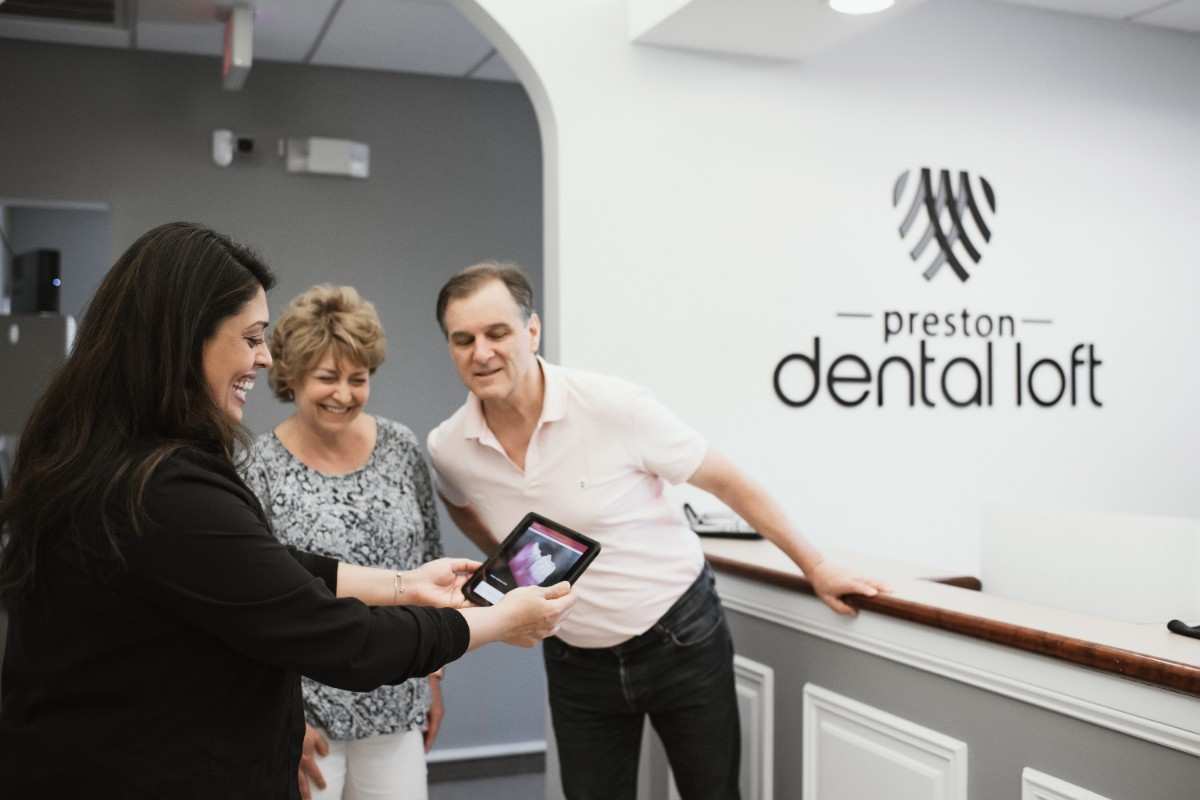 Photo of a team member and a patient bumping elbows