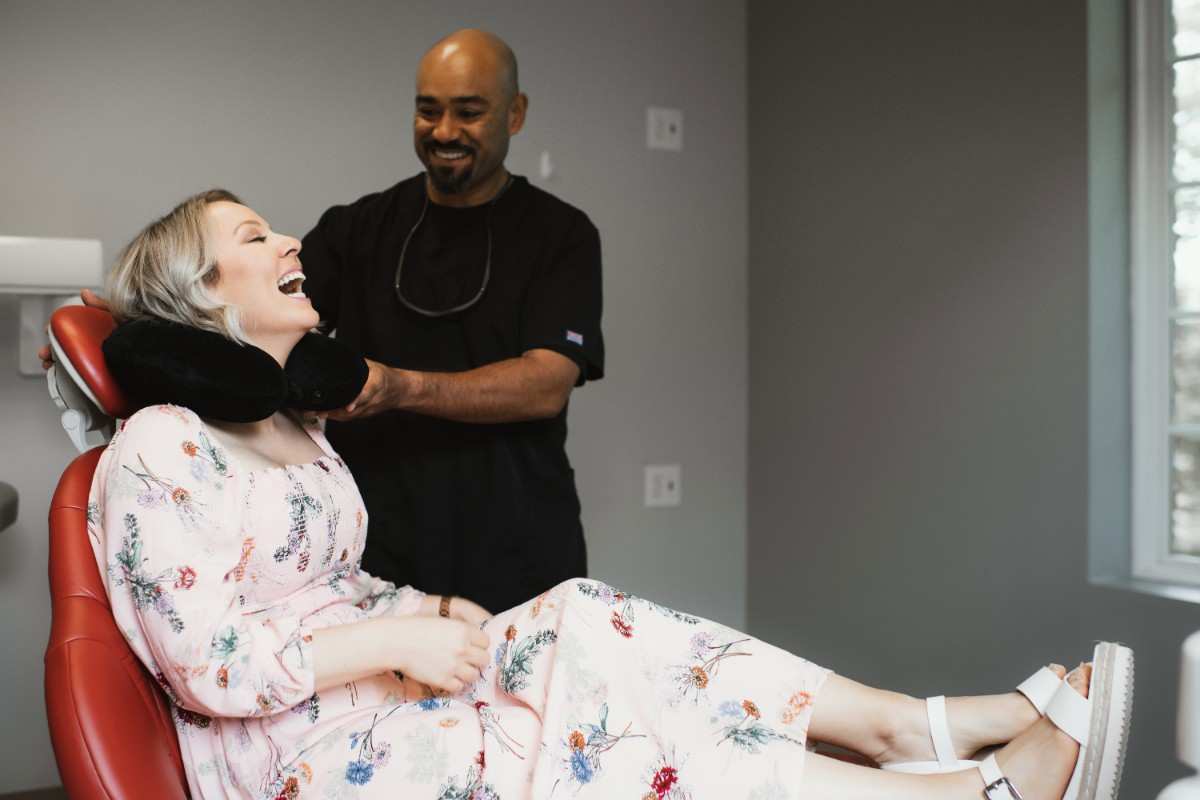 Photo of a team member and a patient bumping elbows