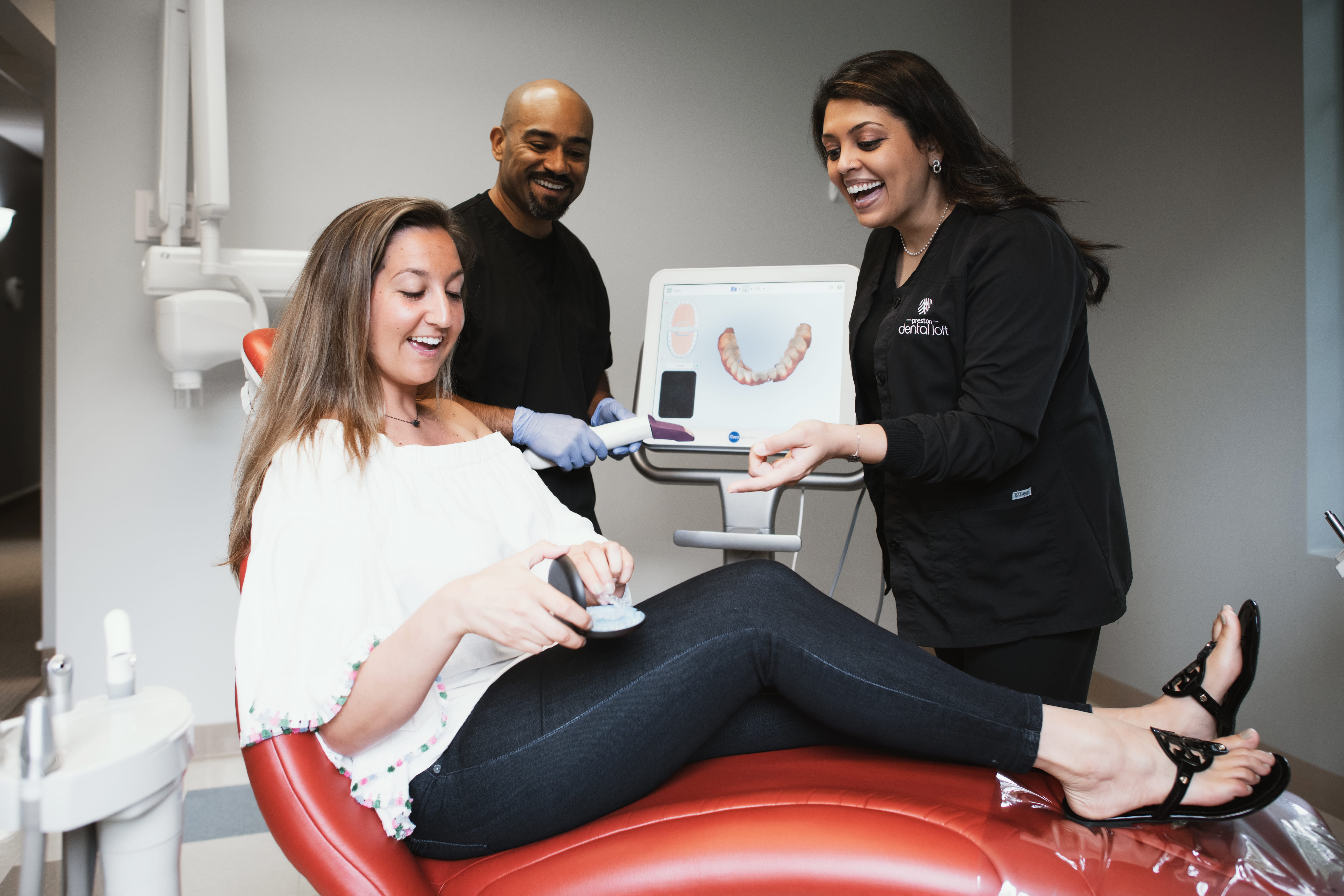 Photo of a team member and a patient bumping elbows