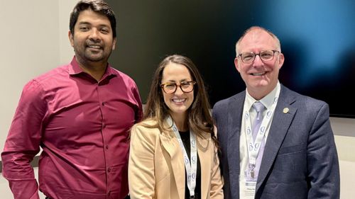 Room full of professionals meeting