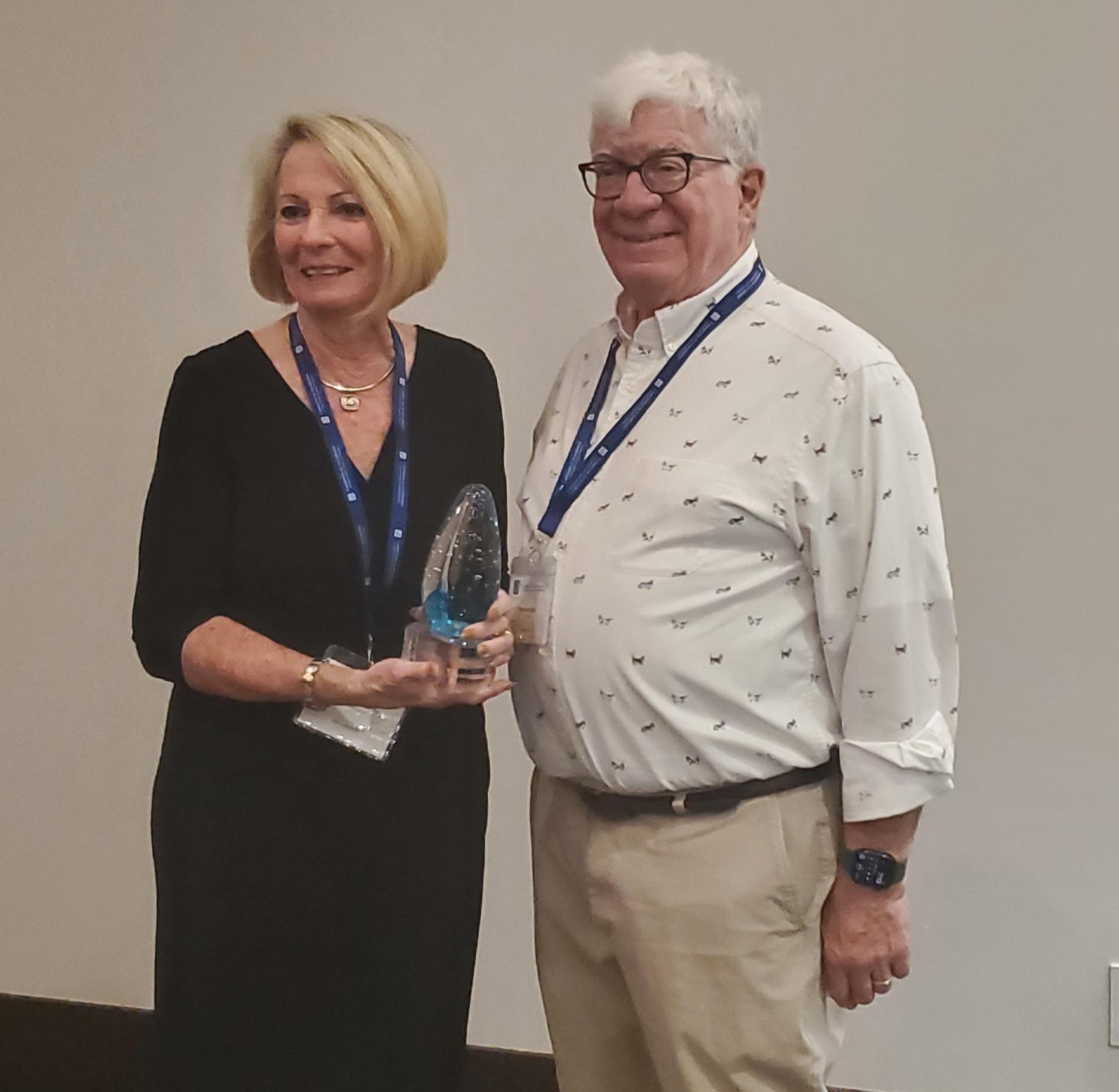 2025 Award Recipient Catherine Rienzo and President Barry Eckert