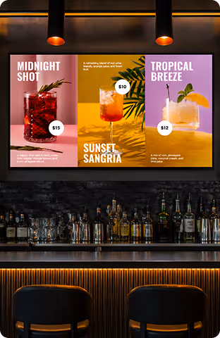 Bar menu board with images and prices of three cocktails: Midnight Shot, Sunset Sangria, and Tropical Breeze.