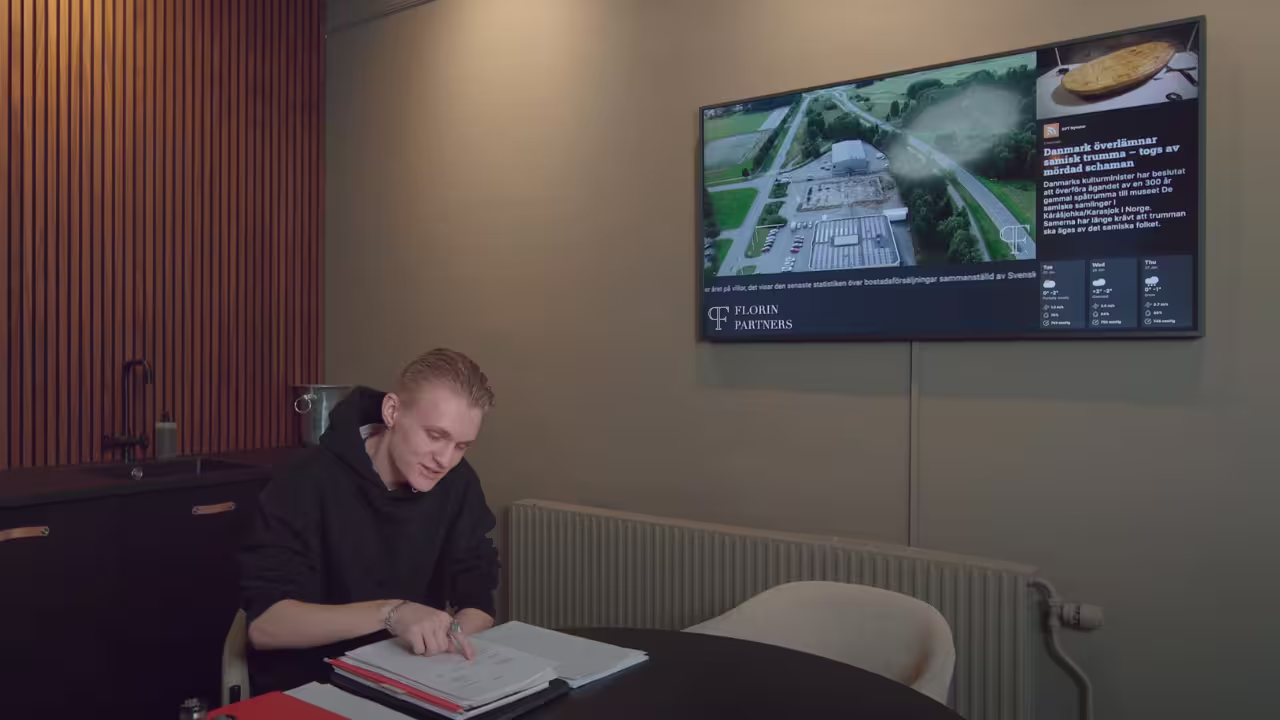 TV screen in real estate meeting room
