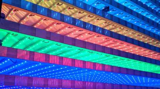 Vertical farm facility with Growth Trays, LED lights, and central HVAC technology.