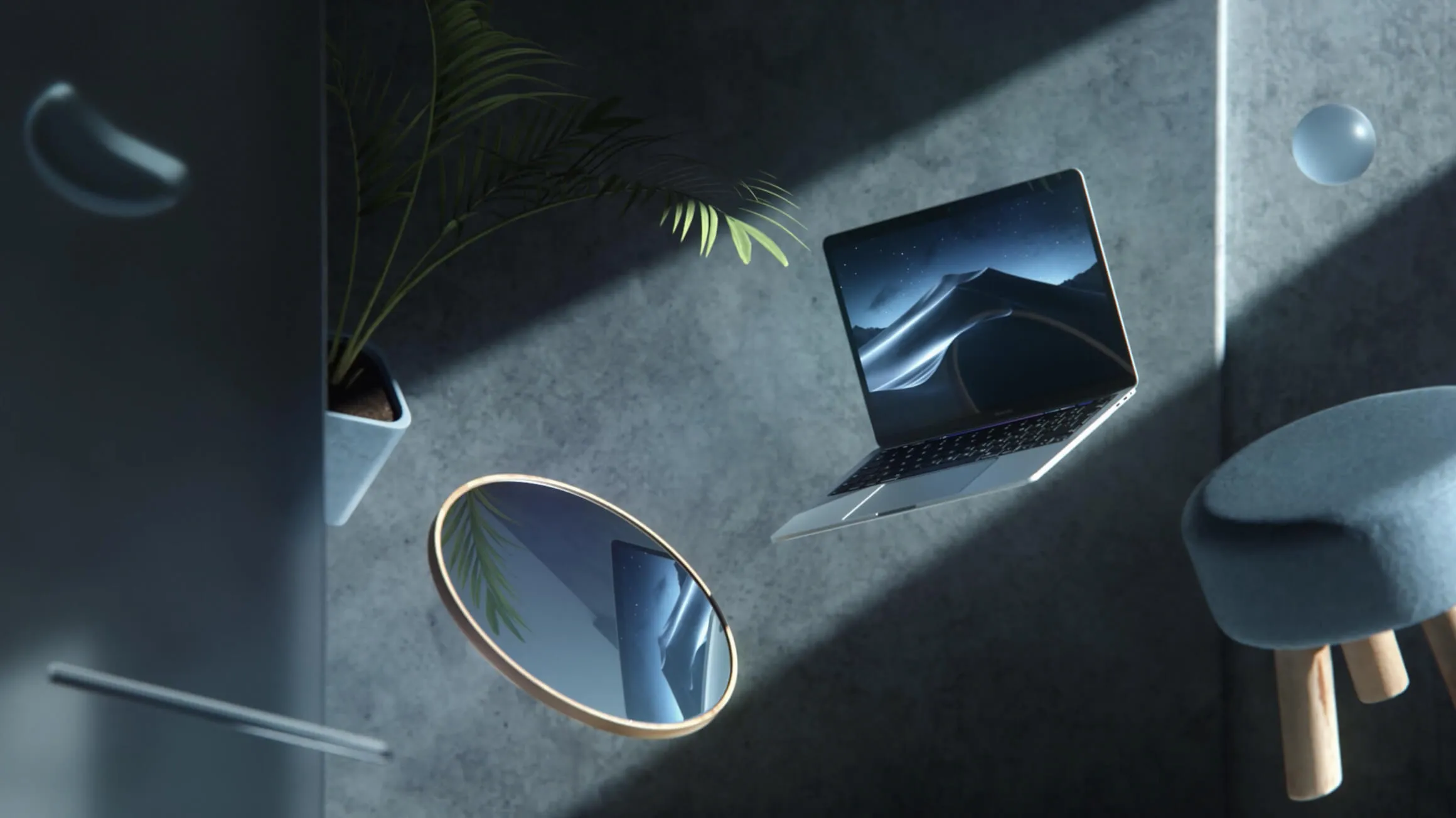 A laptop rests against a wall, reflecting in a nearby mirror, creating a modern workspace aesthetic.