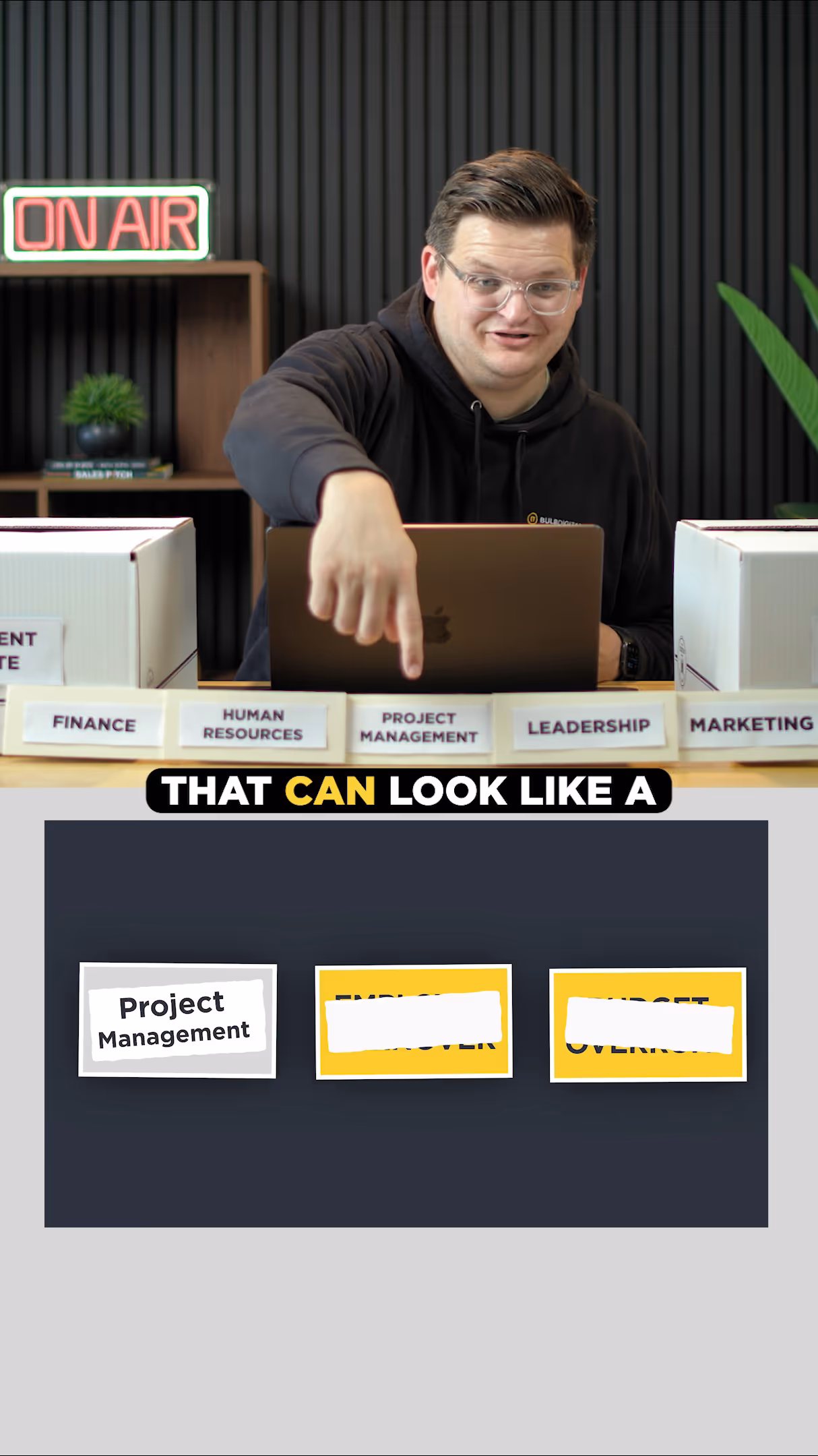 person pointing to project mangament card